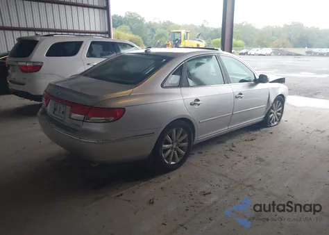 2010 Hyundai Azera Limited z USA, uszkodzony, nr VIN KMHFC4DF3AA451132